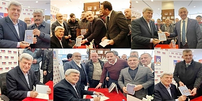 Karaosmanoğlu'na ‘Herkesin Başkanı’ kitabını imzalatmaya geldiler